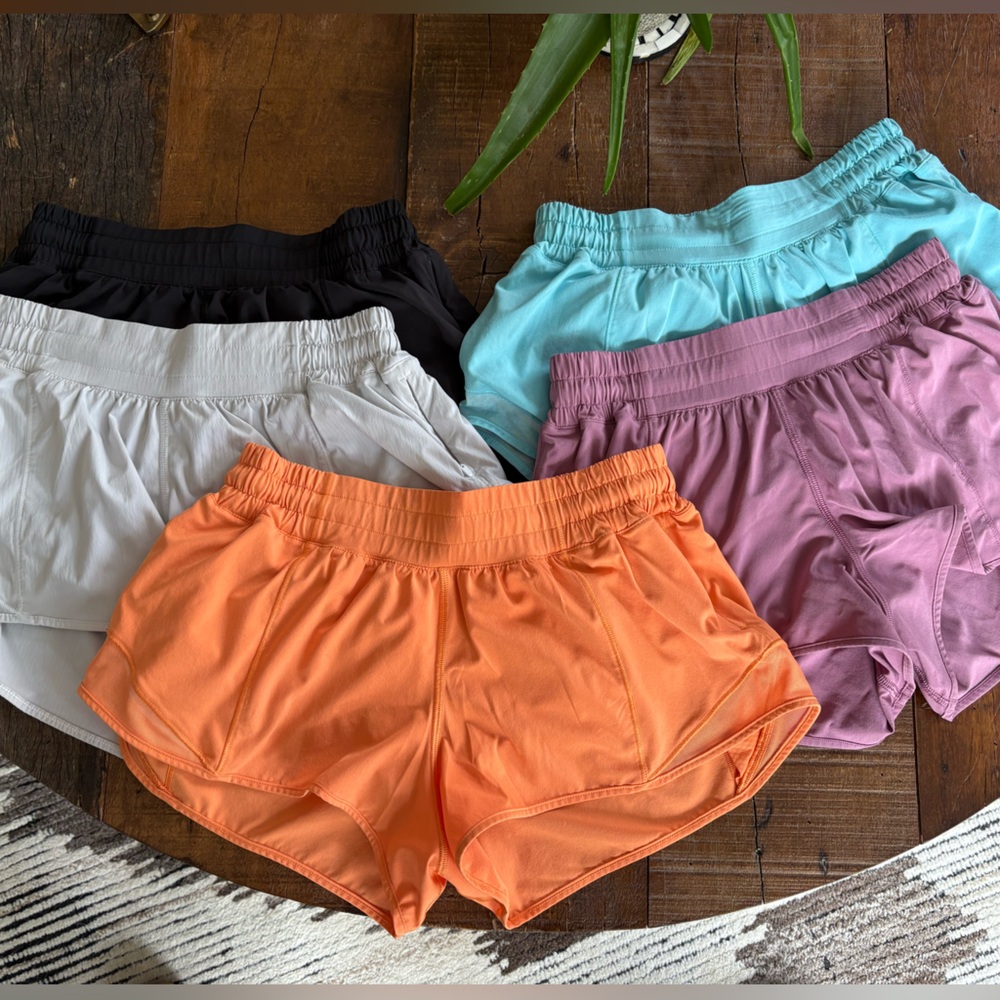 5 pairs of Lululemon hotty hot shorts. All size 6, low rise, & 2.5 inch inseam